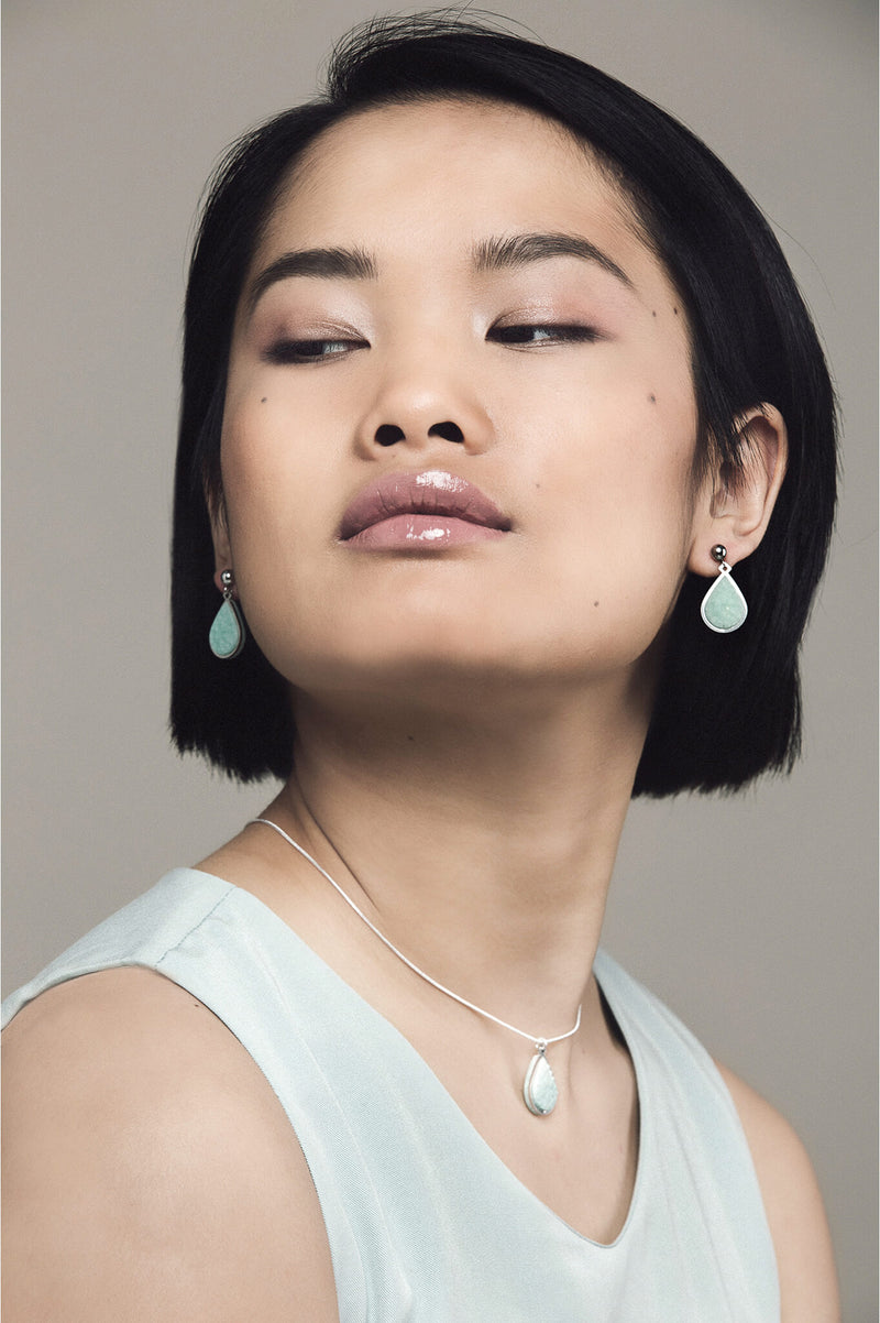 model wearing matching mint green Candide teardrop studs and necklace by Bijoux Pépine Montréal