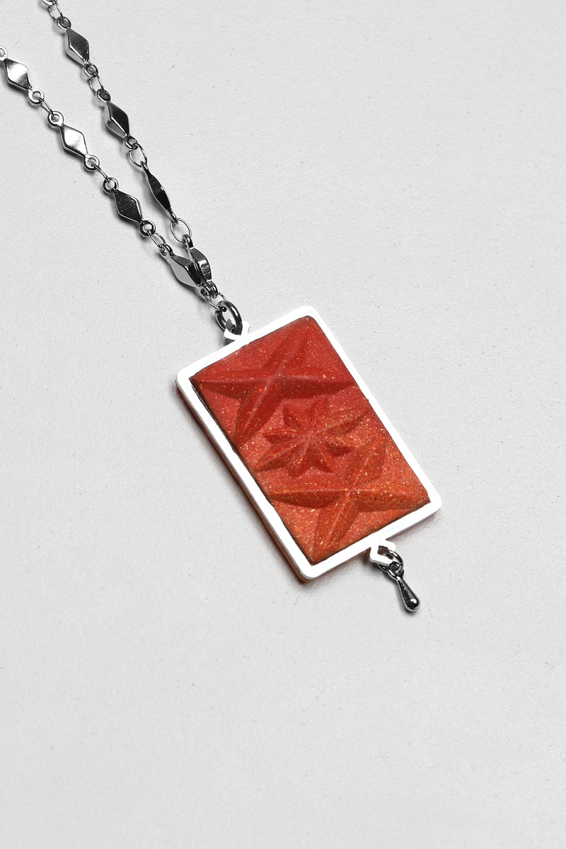 Bijojux Pépine's Dihya, handmade luxury necklace in coral red resin and hypoallergenic stainless steel