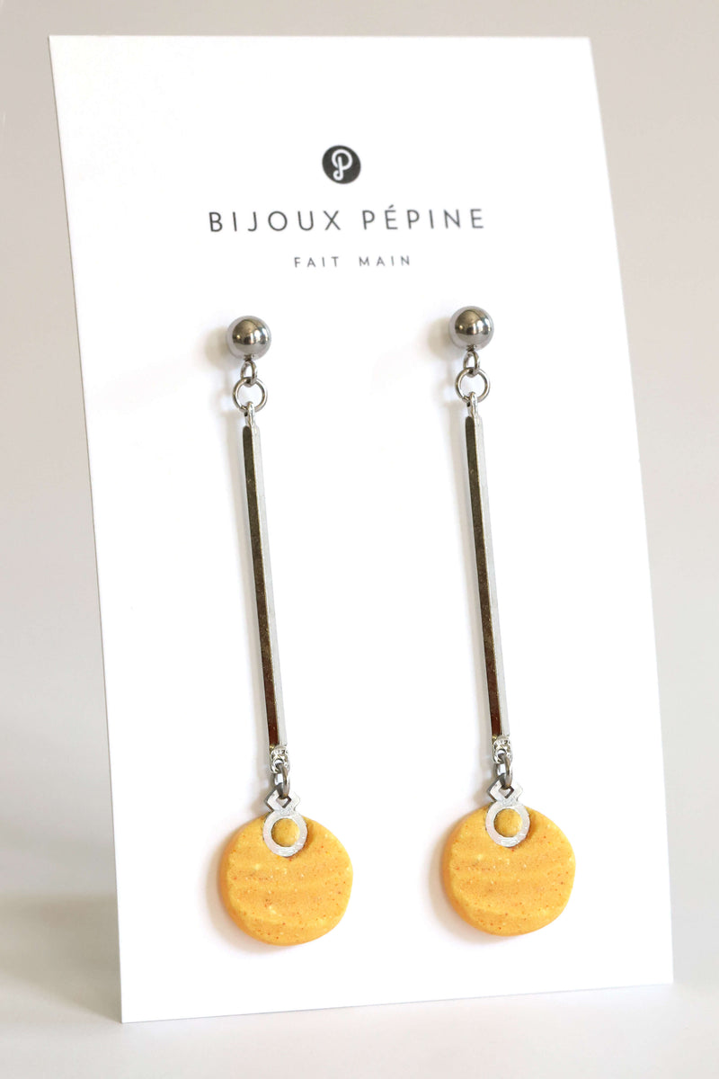 Dune earrings, handmade dangling studs in two-toned yellow ochre resin and hypoallergenic stainless steel
