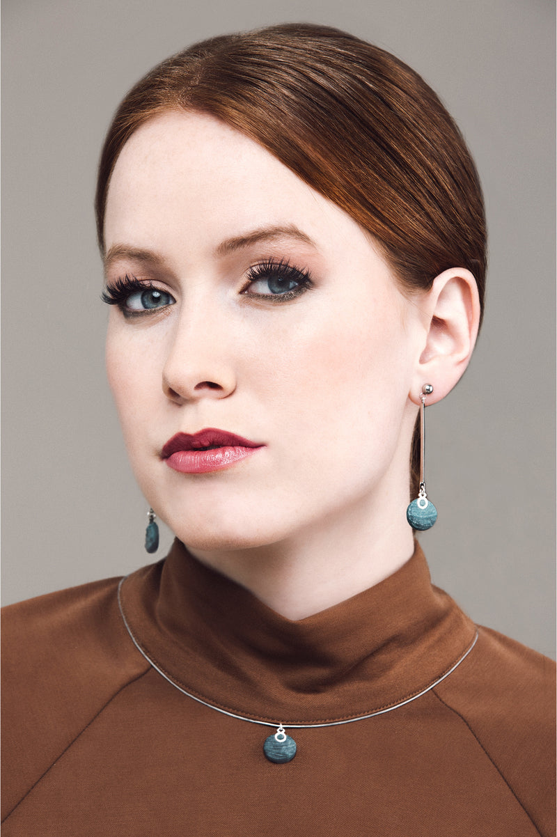model wearing Montreal handmade Dune earrings and necklace in two-toned forest green by Bijoux Pépine