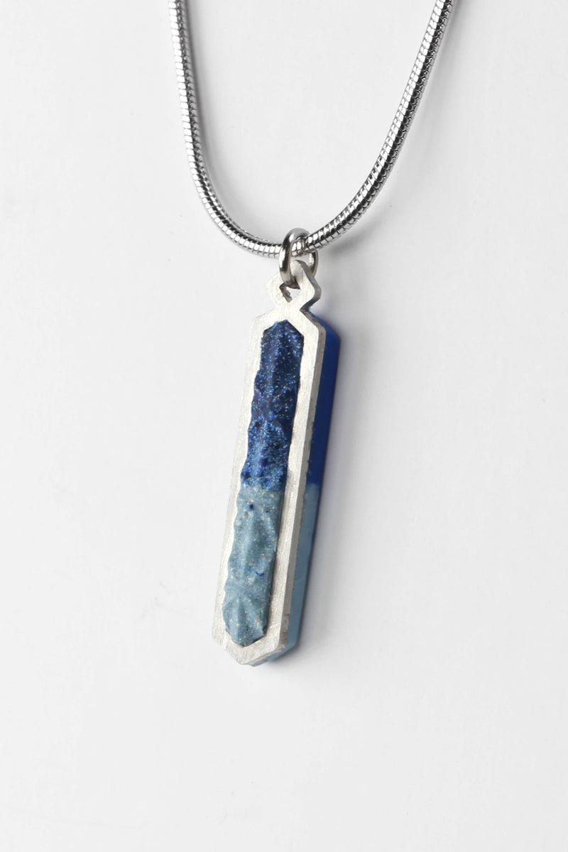 Solstice teardrop adjustable length necklace in resin and hypoallergenic stainless steel indigo blue color
