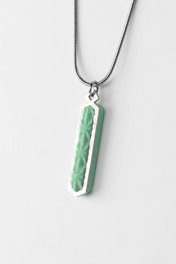 Solstice adjustable length necklace in green color sustainable resin and hypoallergenic stainless steel chain, handmade process