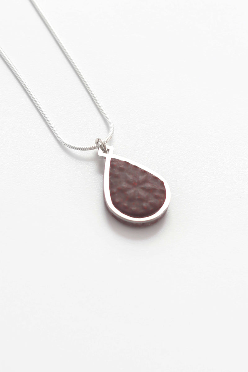 Candide teardrop adjustable length necklace in burgundy red resin and hypoallergenic stainless steel