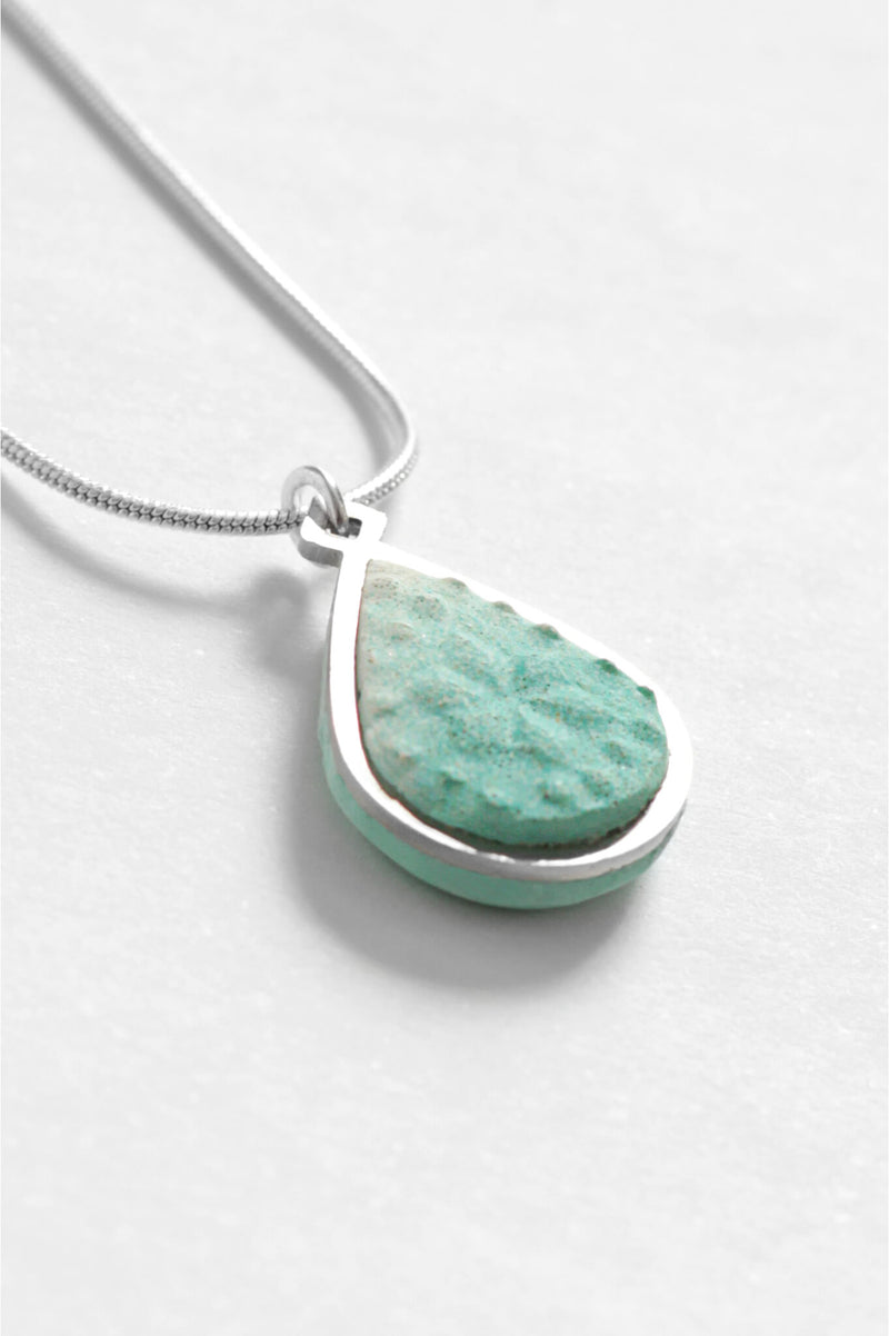 Candide teardrop adjustable length necklace in mint green resin and hypoallergenic stainless steel