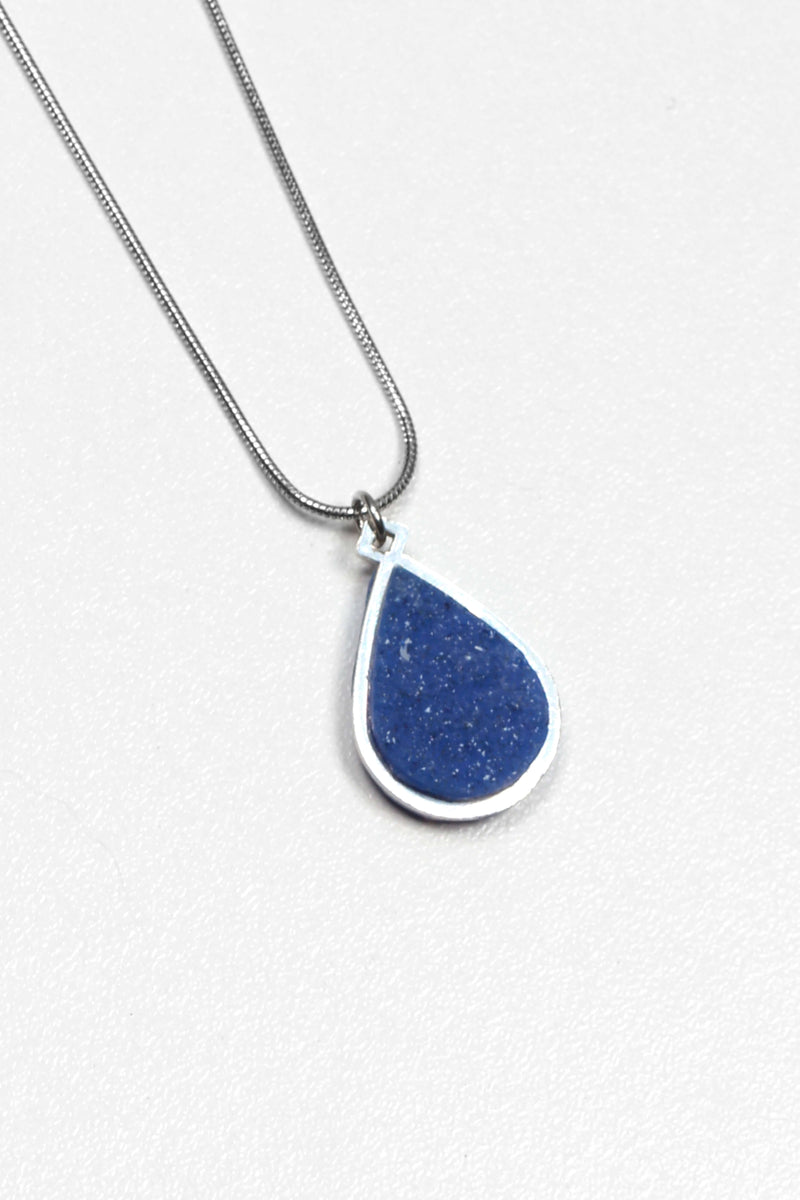 Candide teardrop adjustable length necklace in blue indigo resin and hypoallergenic stainless steel