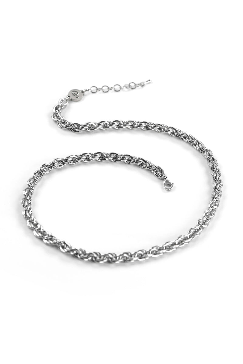fashion model wearing designer Bijoux Pépine’s hypoallergenic stainless steel signature chain bracelet and necklace