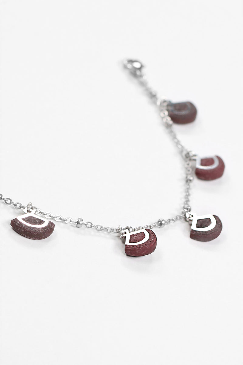 St-Jacques, luxury charms bracelet handmade in Canada with hypoallergenic stainless steel and burgundy red resin