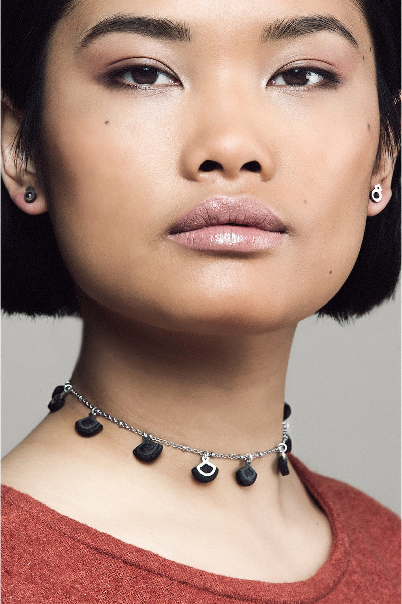 fashion model wearing designer Bijoux Pépine's St-Jacques luxury necklace in black