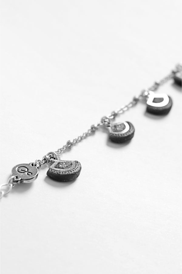 St-Jacques, luxury charms bracelet handmade with hypoallergenic stainless steel and black resin
