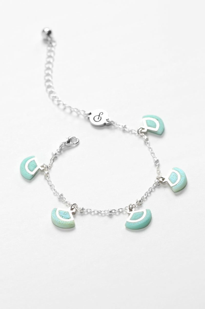 St-Jacques, luxury charms bracelet handmade in Canada with hypoallergenic stainless steel and mint green resin